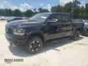 2023 Ram 1500 Rebel with VIN 1C6SRFLT4PN554816, listed as a Copart auction lot 66319915 with 96,984 mi miles and Salvage title. Bid and sale history available at DreamBid. Image 1.