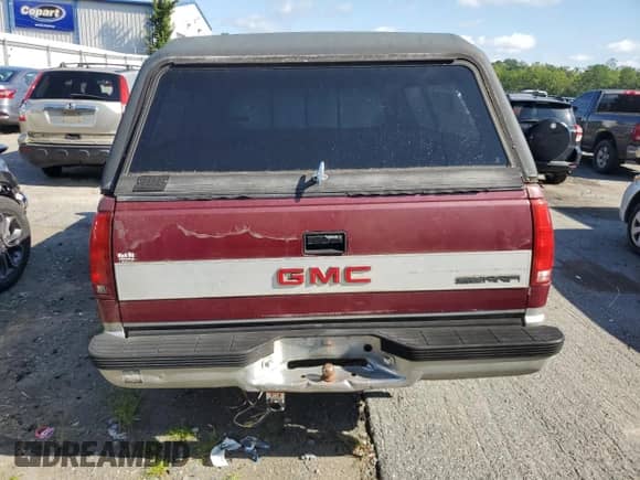 1989 GMC Sierra 1500 z VIN 1GTDC14K2KE536979, wystawiony jako Copart lot #67909305 z przebiegiem 187 105 mil mil oraz Szkoda całkowita • Salvage title. Historia ofert i sprzedaży dostępna na DreamBid. Obrazek 6.