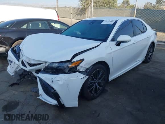 2023 Toyota Camry SE with VIN 4T1G11AK2PU742545, listed as a IAAI auction lot 43325664 with 56,037 mi miles and . Bid and sale history available at DreamBid. Image 2.
