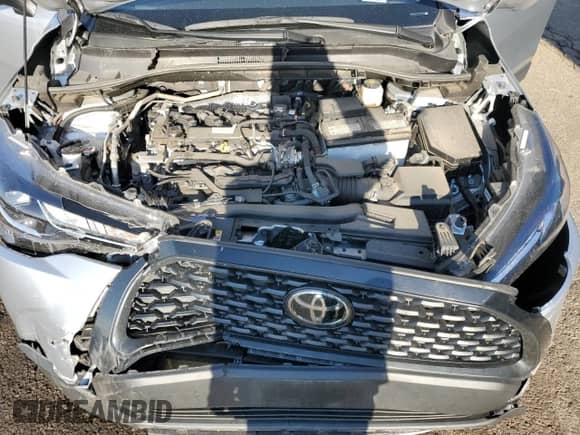 2022 Toyota Corolla Cross L with VIN 7MUAAABG7NV018734, listed as a Copart auction lot 69626985 with 27,871 mi miles and Salvage title. Bid and sale history available at DreamBid. Image 11.