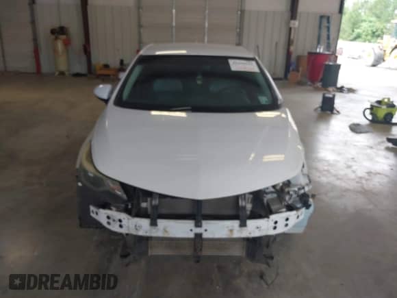 2017 Chevrolet Cruze Premier z VIN 3G1BF6SM0HS603053, wystawiony jako IAAI lot #42439222 z przebiegiem Nie podano mil oraz . Historia ofert i sprzedaży dostępna na DreamBid. Obrazek 13.