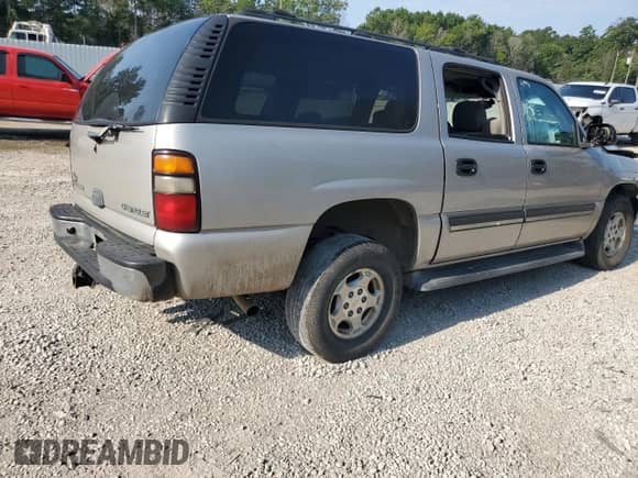 2005 Chevrolet Suburban LS with VIN 3GNEC16Z95G159375, listed as a Copart auction lot 65865884 with 290,671 mi miles and Salvage title. Bid and sale history available at DreamBid. Image 3.
