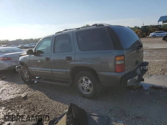 2000 Chevrolet Tahoe LS z VIN 1GNEC13T2YJ104513, wystawiony jako Copart lot #66882344 z przebiegiem Nie podano mil oraz Szkoda całkowita • Salvage title. Historia ofert i sprzedaży dostępna na DreamBid. Obrazek 2.
