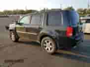 2010 Honda Pilot Touring with VIN 5FNYF4H87AB038749, listed as a Copart auction lot 69882305 with 141,496 mi miles and Salvage title. Bid and sale history available at DreamBid. Image 2.