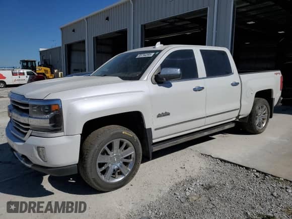 2017 Chevrolet Silverado 1500 High Country с VIN 3GCUKTEJXHG216945, выставлен на аукционе Copart как лот 85794395 с пробегом 129 032 миль миль и Списание • Salvage title. История ставок и продаж доступна на DreamBid. Изображение 1.