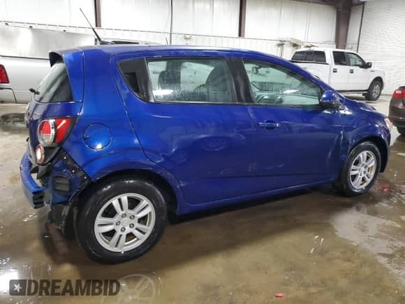 2012 Chevrolet Sonic LS with VIN 1G1JB6SH1C4191521, listed as a Copart auction lot 71214214 with 83,910 mi miles and Salvage title. Bid and sale history available at DreamBid. Image 3.