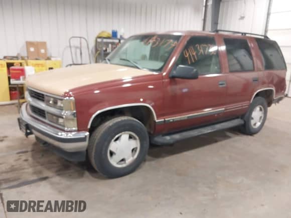 1998 Chevrolet Tahoe with VIN 1GNEK13RXWJ330934, listed as a IAAI auction lot 41431736 with 269,137 mi miles and . Bid and sale history available at DreamBid. Image 2.