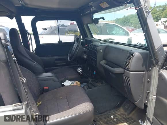 2001 Jeep Wrangler SE with VIN 1J4FA29P01P305939, listed as a IAAI auction lot 42624451 with 170,315 mi miles and . Bid and sale history available at DreamBid. Image 5.