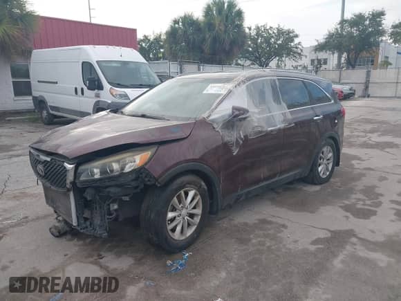 2017 Kia Sorento LX z VIN 5XYPG4A31HG270631, wystawiony jako IAAI lot #41655762 z przebiegiem Nie podano mil oraz . Historia ofert i sprzedaży dostępna na DreamBid. Obrazek 17.