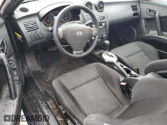 2008 Hyundai Tiburon GS с VIN KMHHM66D28U284008, выставлен на аукционе Copart как лот 55500035 с пробегом 108 084 миль миль и Списание • Salvage title. История ставок и продаж доступна на DreamBid. Изображение 8.