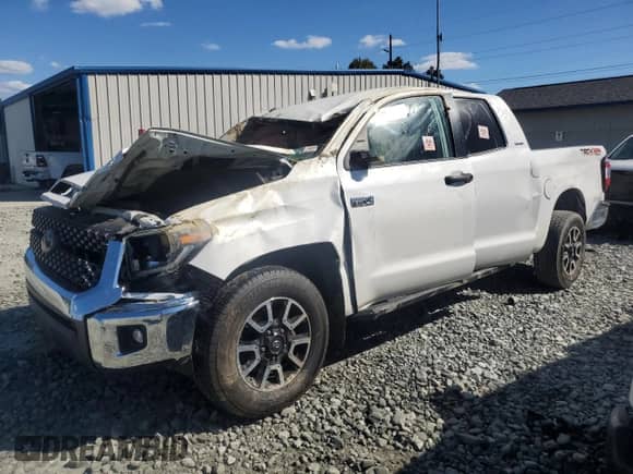 2019 Toyota Tundra SR5 с VIN 5TFUW5F15KX858913, выставлен на аукционе Copart как лот 70197865 с пробегом Не указан миль и Списание • Salvage title. История ставок и продаж доступна на DreamBid. Изображение 1.