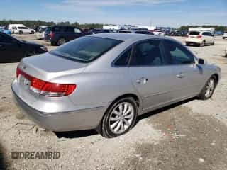 2006 Hyundai Azera SE с VIN KMHFC46F06A131299, выставлен на аукционе Copart как лот 45577255 с пробегом 67 847 миль миль и Списание • Salvage title. История ставок и продаж доступна на DreamBid. Изображение 3.