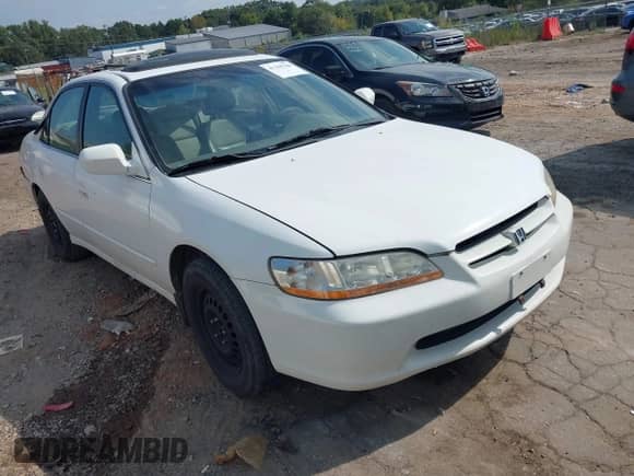 1999 Honda Accord EX with VIN 1HGCG165XXA022773, listed as a IAAI auction lot 43295768 with 294,333 mi miles and . Bid and sale history available at DreamBid. Image 1.