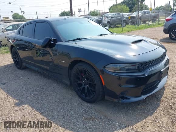 2020 Dodge Charger R/T with VIN 2C3CDXCT3LH136501, listed as a IAAI auction lot 42279799 with 86,929 mi miles and . Bid and sale history available at DreamBid. Image 1.