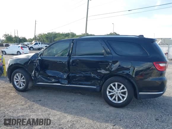 2019 Dodge Durango SXT with VIN 1C4RDJAG1KC664855, listed as a IAAI auction lot 42650190 with 82,468 mi miles and . Bid and sale history available at DreamBid. Image 14.
