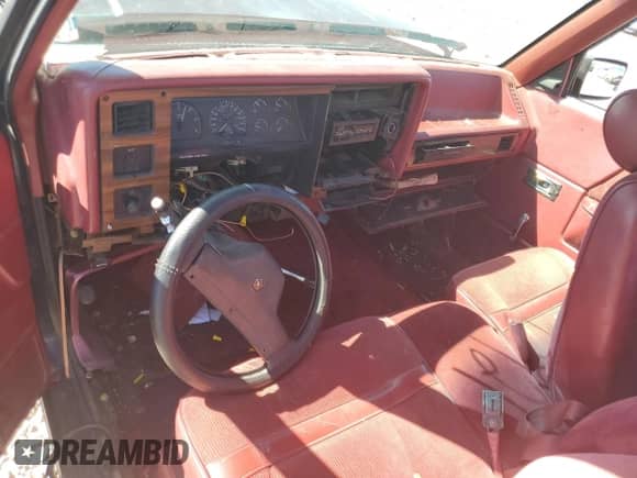 1990 Dodge Dakota z VIN 1B7FL23X7LS653679, wystawiony jako Copart lot #72073034 z przebiegiem 254 327 mil mil oraz Szkoda całkowita • Salvage title. Historia ofert i sprzedaży dostępna na DreamBid. Obrazek 8.