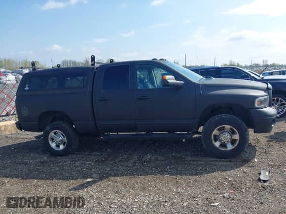 2005 Dodge 2500 SLT z VIN 3D7KS28C25G844501, wystawiony jako IAAI lot #42176860 z przebiegiem 238 386 mil mil oraz . Historia ofert i sprzedaży dostępna na DreamBid. Obrazek 13.