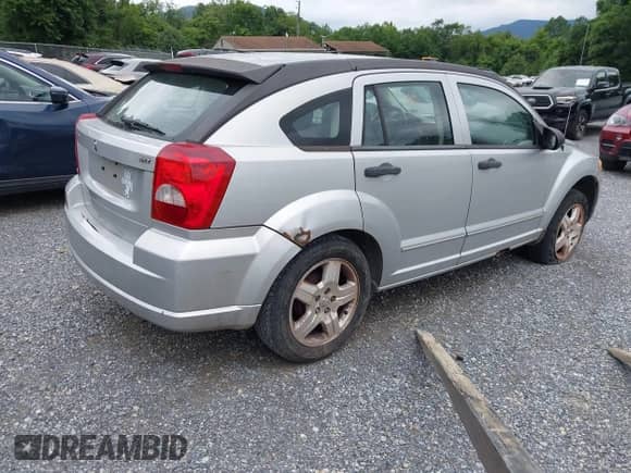 2007 Dodge Caliber SXT with VIN 1B3HB48C37D209627, listed as a IAAI auction lot 42780585 with 206,117 mi miles and . Bid and sale history available at DreamBid. Image 4.