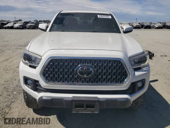 2019 Toyota Tacoma SR5 с VIN 3TMDZ5BN6KM058580, выставлен на аукционе Copart как лот 65633265 с пробегом 30 232 миль миль и Списание • Salvage title. История ставок и продаж доступна на DreamBid. Изображение 5.