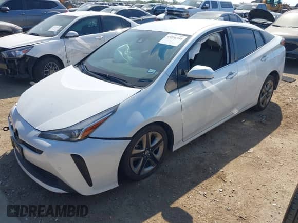 2021 Toyota Prius Limited with VIN JTDKAMFU9M3130578, listed as a IAAI auction lot 43236398 with 258,496 mi miles and . Bid and sale history available at DreamBid. Image 2.