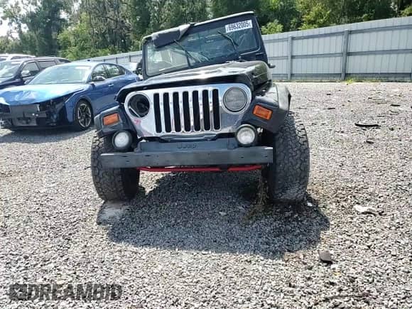 1997 Jeep Wrangler Sahara с VIN 1J4FY49S5VP542704, выставлен на аукционе Copart как лот 69632005 с пробегом 151 468 миль миль и Списание • Salvage title. История ставок и продаж доступна на DreamBid. Изображение 13.