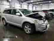 2010 Dodge Journey SXT with VIN 3D4PG5FV6AT190999, listed as a Copart auction lot 69599345 with 127,601 mi miles and Salvage title. Bid and sale history available at DreamBid. Image 4.