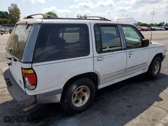 1997 Ford Explorer XL с VIN 1FMDU32E3VZB77947, выставлен на аукционе Copart как лот 80499815 с пробегом 168 017 миль миль и Списание • Salvage title. История ставок и продаж доступна на DreamBid. Изображение 3.