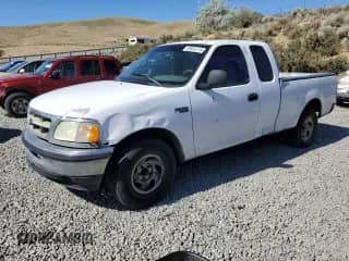 1998 Ford F-150 with VIN 1FTZX1720WKA20813, listed as a Copart auction lot 63852215 with 215,729 mi miles and Salvage title. Bid and sale history available at DreamBid. Image 1.
