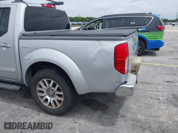 2010 Nissan Frontier SE with VIN 1N6AD0ER7AC404863, listed as a IAAI auction lot 42421937 with 200,669 mi miles and . Bid and sale history available at DreamBid. Image 17.