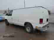 2001 Ford Econoline Cargo z VIN 1FTRE142X1HB27593, wystawiony jako Copart lot #83827154 z przebiegiem 190 761 mil mil oraz Szkoda całkowita • Salvage title. Historia ofert i sprzedaży dostępna na DreamBid. Obrazek 2.