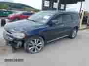 2013 Dodge Durango Crew with VIN 1C4RDJDG6DC690060, listed as a IAAI auction lot 43134968 with 160,833 mi miles and . Bid and sale history available at DreamBid. Image 2.