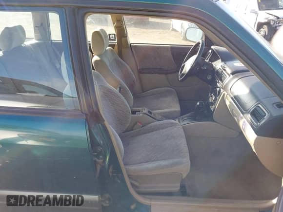 1998 Subaru Forester S with VIN JF1SF6554WH759085, listed as a IAAI auction lot 41794273 with 152,949 mi miles and . Bid and sale history available at DreamBid. Image 5.