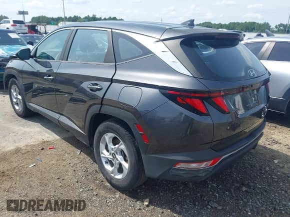 2022 Hyundai Tucson SE with VIN 5NMJA3AEXNH021457, listed as a IAAI auction lot 42775004 with 58,986 mi miles and . Bid and sale history available at DreamBid. Image 3.