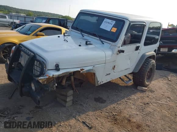 1999 Jeep Wrangler Sport с VIN 1J4FY19S2XP493947, выставлен на аукционе IAAI как лот 43158154 с пробегом Не указан миль и . История ставок и продаж доступна на DreamBid. Изображение 18.