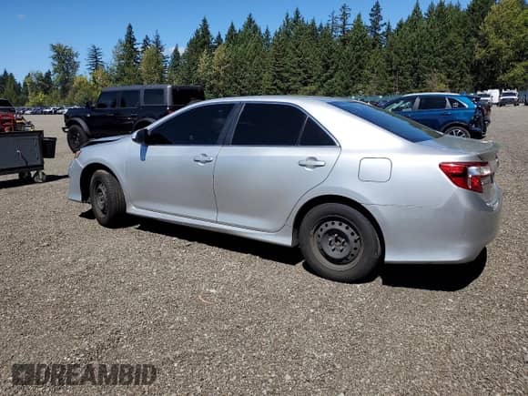 2014 Toyota Camry L with VIN 4T1BF1FK3EU779217, listed as a Copart auction lot 68701495 with 115,910 mi miles and Salvage title. Bid and sale history available at DreamBid. Image 2.