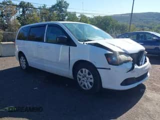 2014 Dodge Grand Caravan SE with VIN 2C4RDGBG0ER379853, listed as a IAAI auction lot 43251278 with 149,299 mi miles and . Bid and sale history available at DreamBid. Image 1.