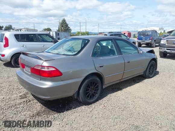 2000 Honda Accord EX with VIN 1HGCG566XYA154787, listed as a IAAI auction lot 42121628 with 225,306 mi miles and . Bid and sale history available at DreamBid. Image 4.