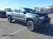 2020 Toyota Tacoma SR5 with VIN 3TMDZ5BNXLM084553, listed as a IAAI auction lot 42556448 with 74,634 mi miles and . Bid and sale history available at DreamBid. Image 1.