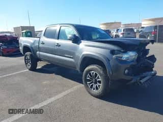 2020 Toyota Tacoma SR5 with VIN 3TMDZ5BNXLM084553, listed as a IAAI auction lot 42556448 with 74,634 mi miles and . Bid and sale history available at DreamBid. Image 1.
