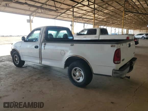 2001 Ford F-150 XL z VIN 1FTZF17291KA10146, wystawiony jako Copart lot #84300515 z przebiegiem 115 342 mil mil oraz Czysty tytuł • Clean title. Historia ofert i sprzedaży dostępna na DreamBid. Obrazek 2.