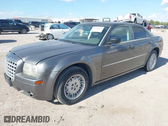 2009 Chrysler 300 LX with VIN 2C3KA43D89H505437, listed as a IAAI auction lot 43384105 with Not provided miles and . Bid and sale history available at DreamBid. Image 2.