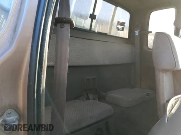 1997 Toyota Tacoma z VIN 4TAWM72N3VZ308584, wystawiony jako Copart lot #76939654 z przebiegiem 259 695 mil mil oraz Szkoda całkowita • Salvage title. Historia ofert i sprzedaży dostępna na DreamBid. Obrazek 10.