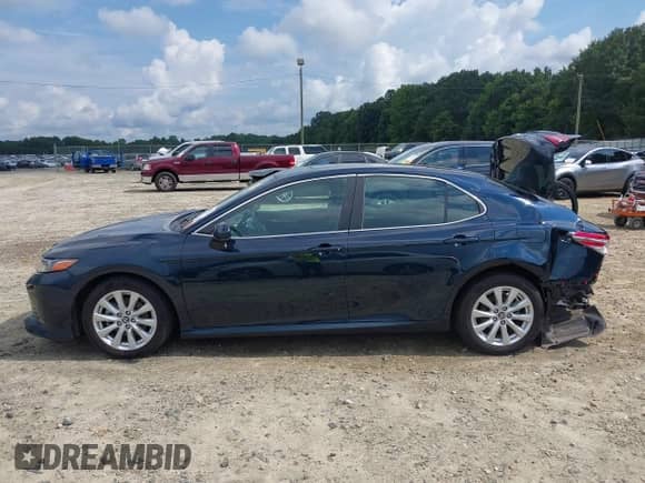 2019 Toyota Camry LE с VIN 4T1B11HK0KU808129, выставлен на аукционе IAAI как лот 43037543 с пробегом 143 999 миль миль и . История ставок и продаж доступна на DreamBid. Изображение 14.