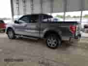 2013 Ford F-150 Lariat with VIN 1FTFW1ET2DFC87796, listed as a Copart auction lot 71112565 with 207,394 mi miles and Salvage title. Bid and sale history available at DreamBid. Image 2.