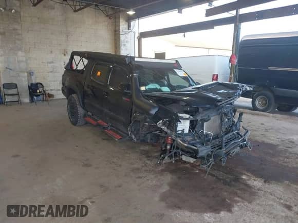 2018 Toyota Tacoma SR with VIN 5TFCZ5AN9JX125940, listed as a IAAI auction lot 41790040 with 80,454 mi miles and . Bid and sale history available at DreamBid. Image 1.