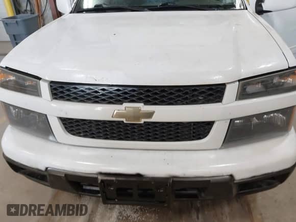 2012 Chevrolet Colorado 1LT с VIN 1GCHTCFEXC8128458, выставлен на аукционе IAAI как лот 41758826 с пробегом 267 202 миль миль и . История ставок и продаж доступна на DreamBid. Изображение 6.
