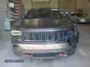 2018 Jeep Grand Cherokee Trailhawk с VIN 1C4RJFLG2JC227951, выставлен на аукционе Copart как лот 81715465 с пробегом 128 266 миль миль и Списание • Salvage title. История ставок и продаж доступна на DreamBid. Изображение 5.
