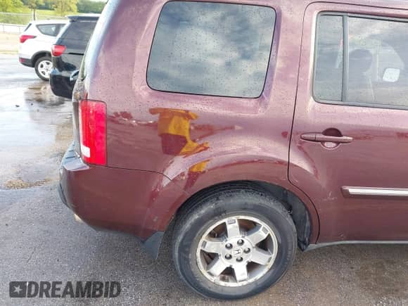 2009 Honda Pilot Touring with VIN 5FNYF38819B022195, listed as a IAAI auction lot 42850497 with 192,072 mi miles and . Bid and sale history available at DreamBid. Image 14.