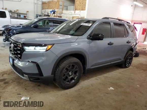 2025 Honda Pilot TrailSport with VIN 5FNYG1H61SB019027, listed as a Copart auction lot 66737735 with 11,721 mi miles and Salvage title. Bid and sale history available at DreamBid. Image 1.