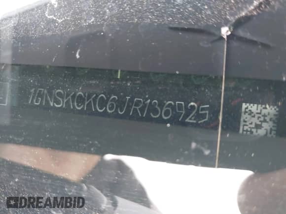 2018 Chevrolet Tahoe Premier with VIN 1GNSKCKC6JR136925, listed as a IAAI auction lot 41082133 with 128,280 mi miles and . Bid and sale history available at DreamBid. Image 9.